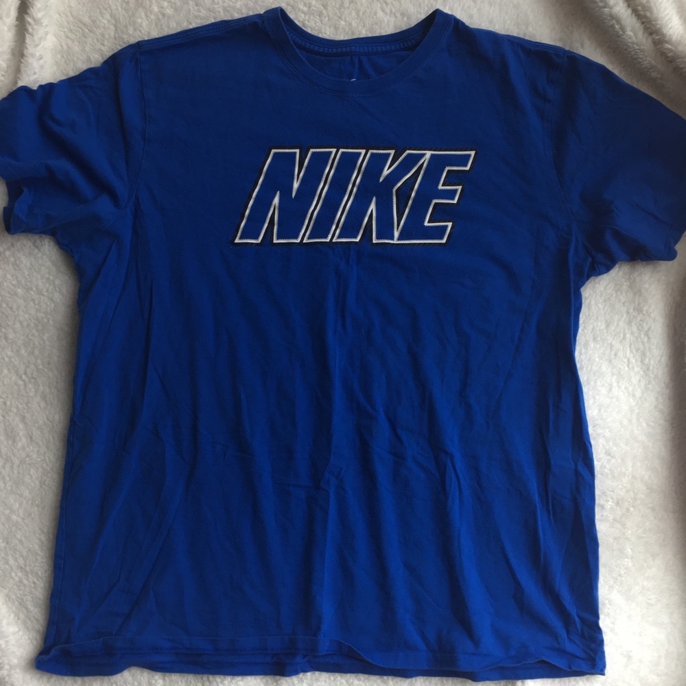 Men’s bright blue NIKE shirt